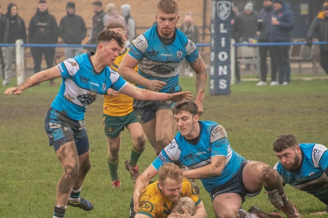 A pride of Lions pounce on Hunslet's Craig McShane in Featherstone Lions' first round Betfred Challenge Cup tie. Picture: Jonathan Buck