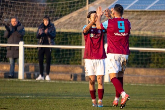 Mick Fish celebrates his goal with an Emley teammate. Picture: Mark Parsons