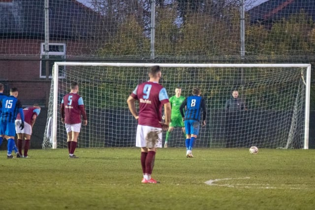 Johnathan Williams lines up the penalty that was to win the game for Maltby Main. Picture: Mark Parsons
