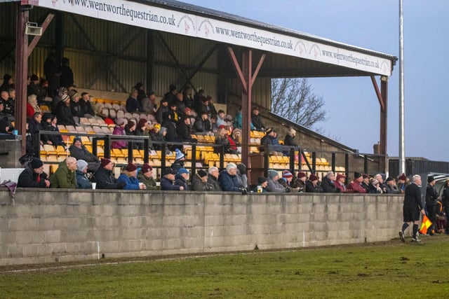 The crowd watches on from the stand at Emley's Fantastic Media Welfare Ground. Picture: Mark Parsons
