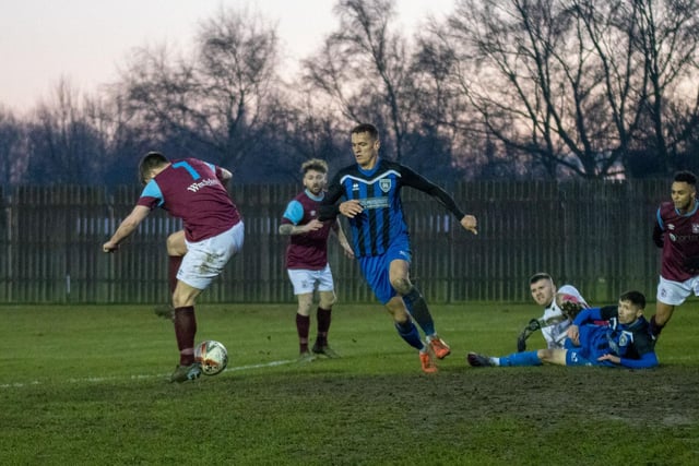 Alex Metcalfe scores with a backheel for Emley to make it 2-2 against Maltby Main. Picture: Mark Parsons