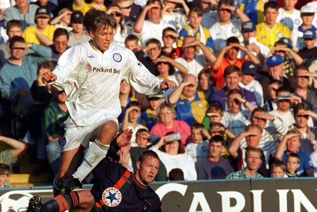 Gunnar Halle skips over the challenge of Newcastle United captain David Batty.
