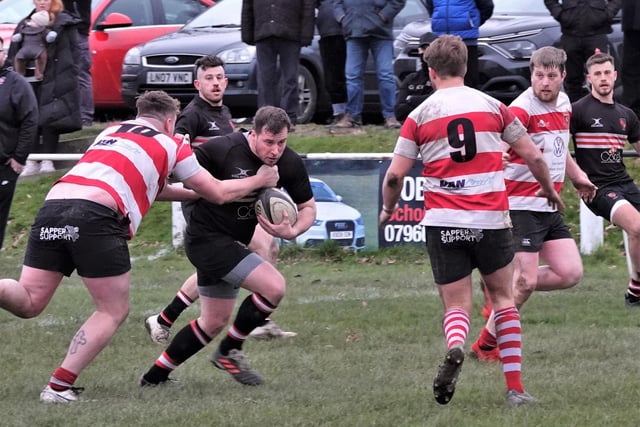 Old Brodleians' Dan Chappell goes on the attack against Cleckheaton. Pic: Robin Sugden