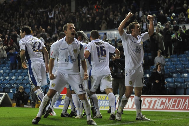 The players celebrate Jermaine Beckford's late goal.