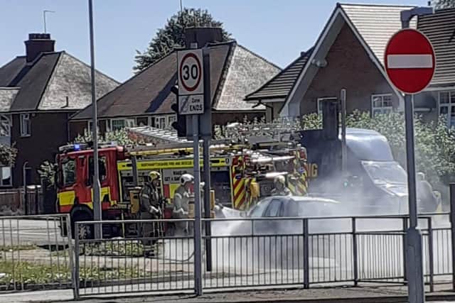 Firefighters at the scene earlier today