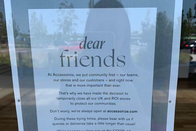 The sign in the window of the Rushden Lakes store