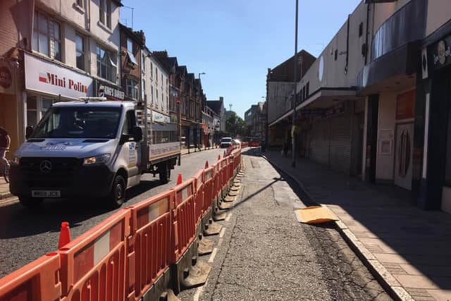 Traders say they are blocked off by the barrier in Montagu Street, with parking spaces also removed. Picture by Alison Holland.