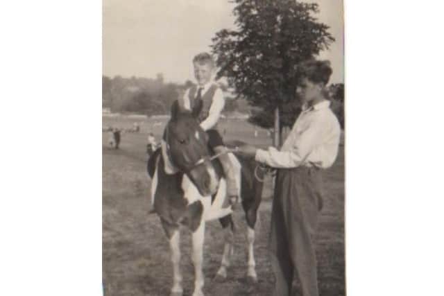 Professor Alan Brookes as a child on a pony ride at Wicksteed Park