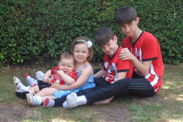 Poppy joined her dad on this family photoshoot.