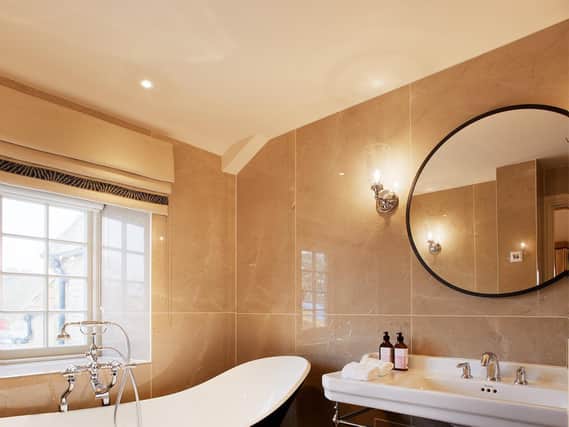 Rooms will feature a roll-top bathtub, period features, and a palette 'inspired by the surrounding countryside'.