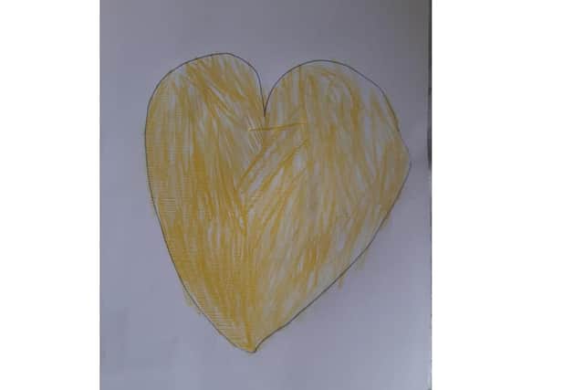 The yellow heart drawn by Jo's grandson