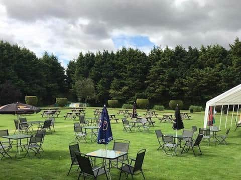 The beer garden on the old bowling green lawns