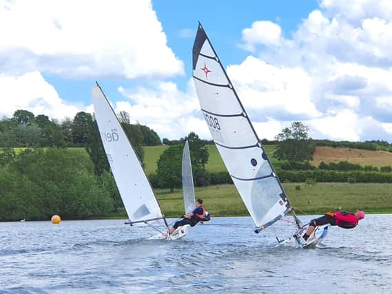 Hollowell sailors are racing again but keeping their distance