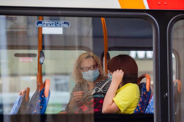 Face coverings are mandatory on buses although there are reports of many not wearing them. Photo: Leila Coker