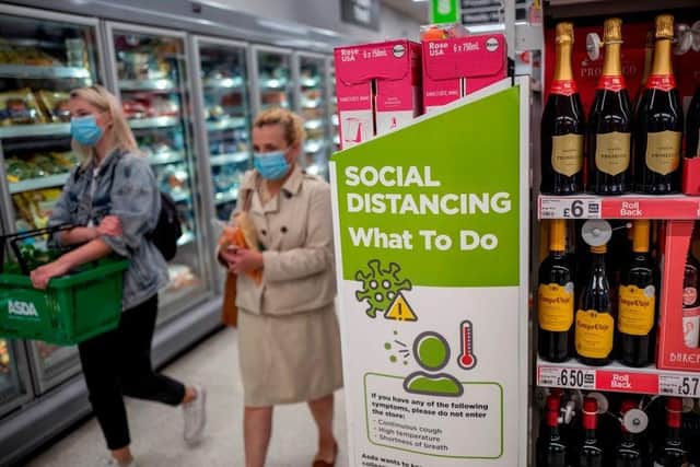 Supermarket shoppers will be forced to wear face coverings in stores from July 24. Photo: Getty Images