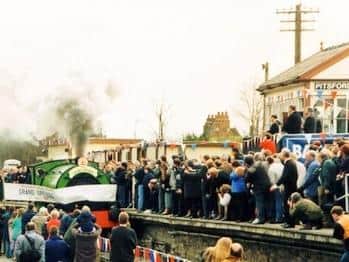 Crowds turned out in force to see the first passengers on the stretch of line in 1995