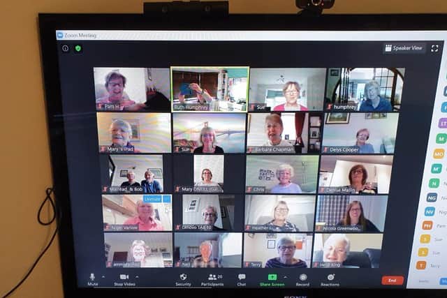 A virtual choir meet on Zoom.