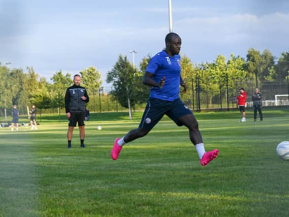 Joel Gyasi is put through his paces, watched by assistant-manager Neil Champelovier as AFC Rushden & Diamonds returned to training on Tuesday. Picture courtesy of HawkinsImages