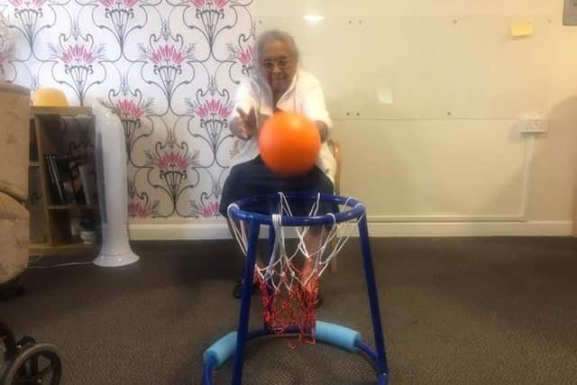 A Bilton Court resident enjoying a basketball exercise