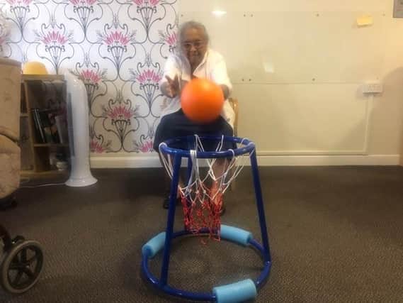 A Bilton Court resident enjoying a basketball exercise