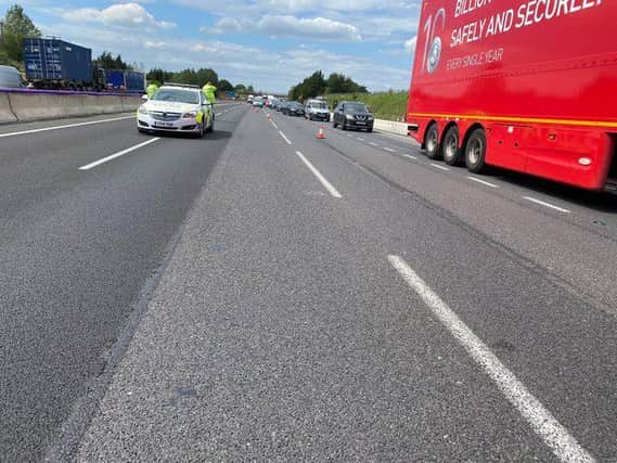 Police are blocking three lanes on the M1 while emergency services deal with the incident. Photo: Northamptonshire Police