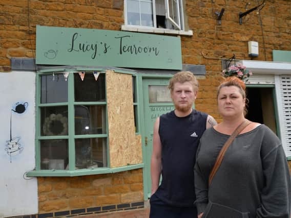 Lucy Clements and her partner Kane Skewis outside her Tea Room. Photo by Andrew Carpenter