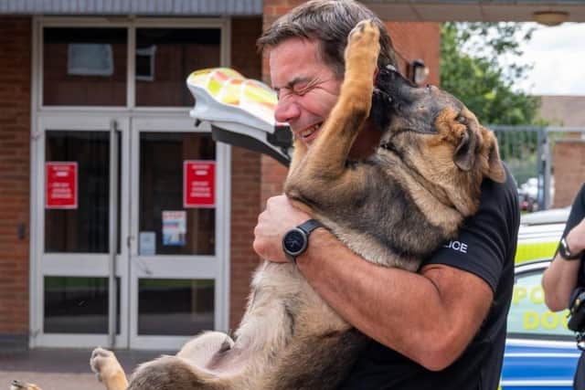 Rookie police dog Duke shows his new Chief Constable no respect at all. Photo: Northamptonshire Police