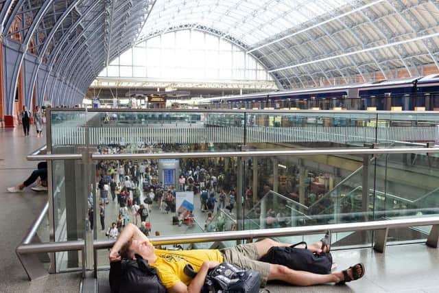 Sweltering pasengers were left stranded at London St Pancras as trains stopped running. Photo: Getty Images
