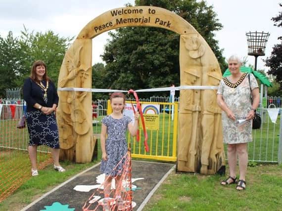 Chairman of East Northamptonshire Council, Cllr Helen Howell and Chairman of Thrapston Town Council (and Mayor of Thrapston) Cllr Karen Draycott. The ribbon was cut by local resident Jemima.