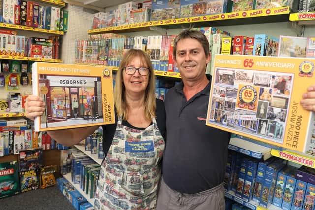 Libby Risdale and Will Osborne with the puzzles