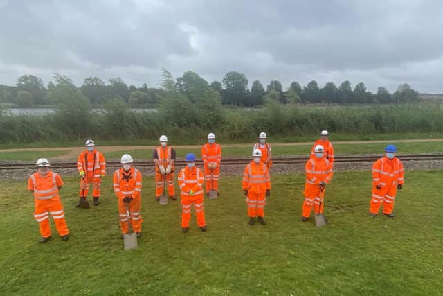 20 volunteers are working on the tracks