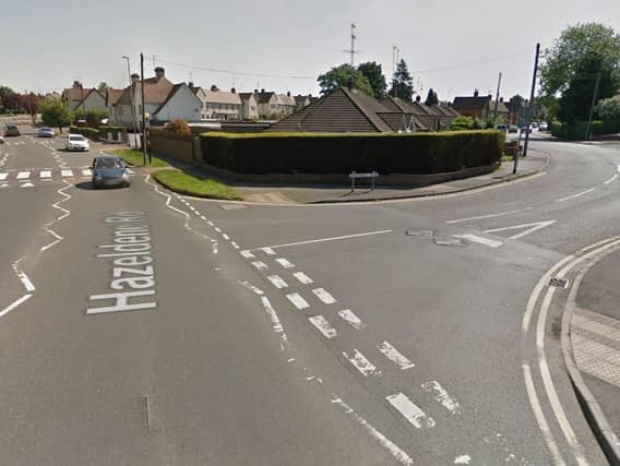 The BMW driver was ambushed at the junction of Brookfield Road and Hazeldene Road on Monday afternoon
