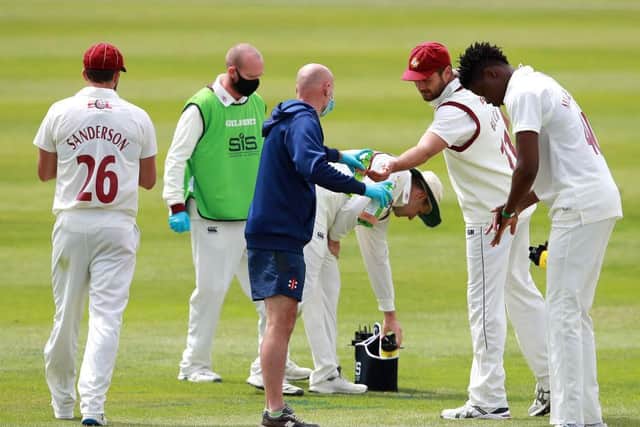 Nathan Buck makes sure his hands are sanitised