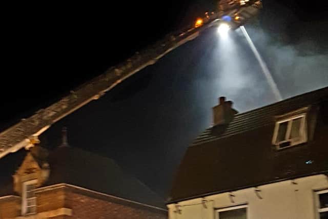 Fire crews tackle the blaze. Credit: WellingbSC