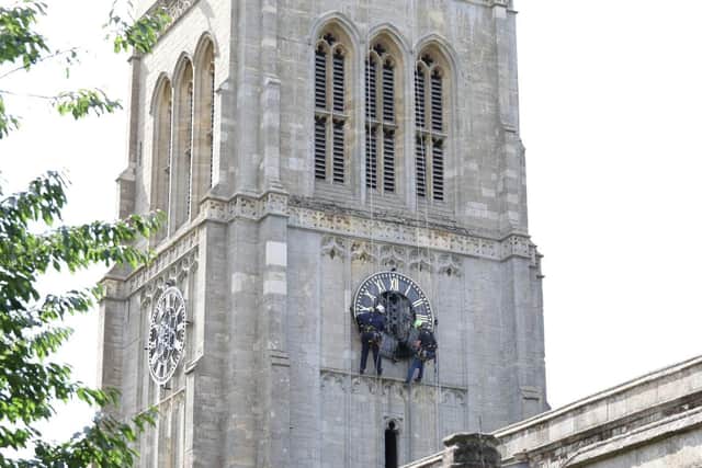 St Peter and St Paul's Church in Kettering town centre has had its clock face re-gilded
