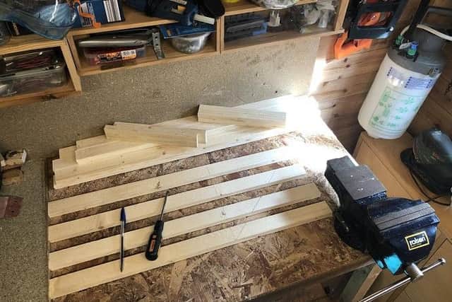 john has drawn up plans for some storage shelves for under the stairs he plans to make