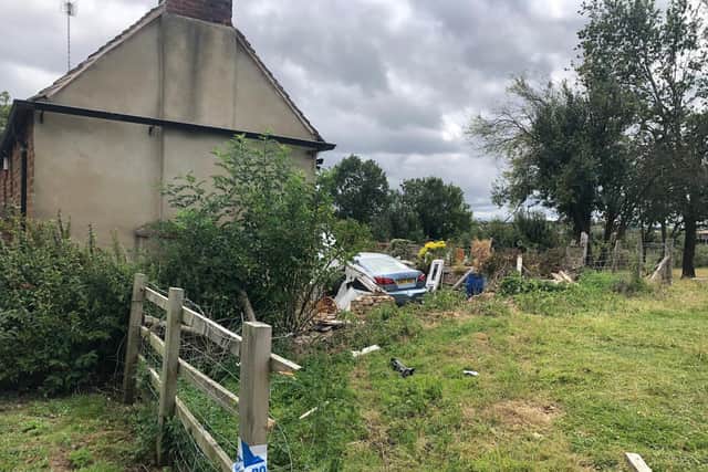 The house on the A6003 in Caldecott