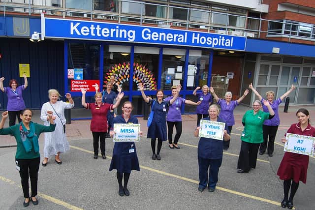 Members of Kettering General Hospitals clinical, housekeeping and infection prevention and control teams celebrate being MRSA bacteraemia free for five years.