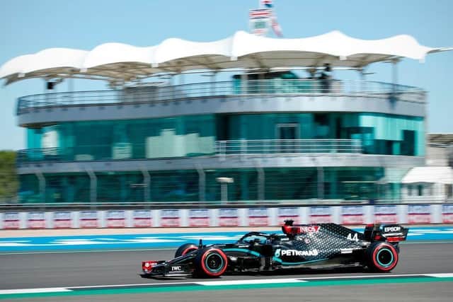 Valtteri Bottas takes his Mercedes for a spin in front of an empty stands at Silverstone during Friday morning practice. Photo: Getty Images