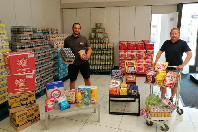 Jamie (left) and Darren inside their new shop.