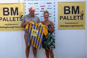 BM Pallets managing director Brian Martin and his wife Sarah show off Wellingborough Towns home shirt after his sponsorship deal with the club