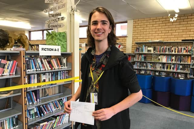 Timothy Brazier with his results.