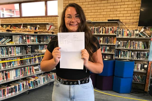 Sydney Thomas with her results.
