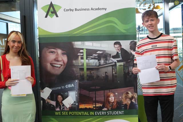Ronni and Jamie with their GCSE results