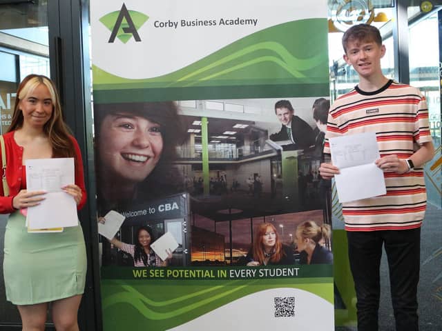 Ronni and Jamie with their GCSE results