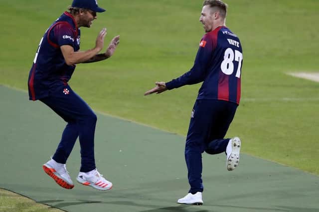 Graeme White enjoys the dismissal of Adam Hose with team-mate Gareth Berg