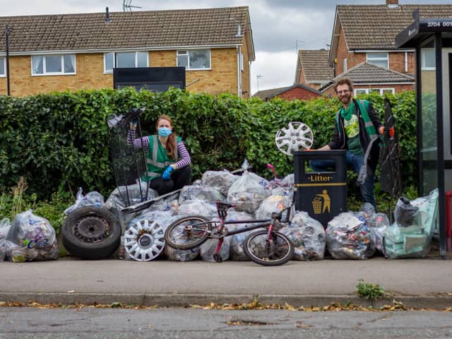 Emily Fedorowycz and Dez Dell with all the litter. Picture by Dan Whitney.