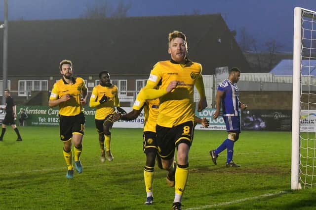 Ben Farrell celebrates scoring a late penalty which gave AFC Rushden & Diamonds a 1-0 victory at Nuneaton Borough in January. Diamonds will be heading back to Nuneaton for the opening day of the new Southern League Premier Central season on September 19. Picture courtesy of HawkinsImages