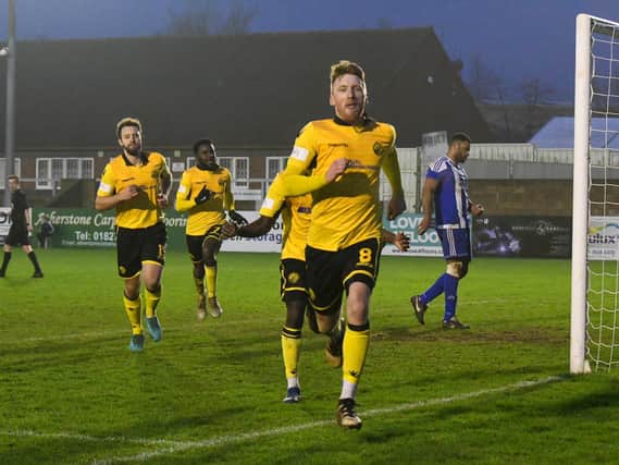 Ben Farrell celebrates scoring a late penalty which gave AFC Rushden & Diamonds a 1-0 victory at Nuneaton Borough in January. Diamonds will be heading back to Nuneaton for the opening day of the new Southern League Premier Central season on September 19. Picture courtesy of HawkinsImages