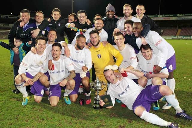 Daventry Town celebrate their 2014 Hillier Senior Cup win